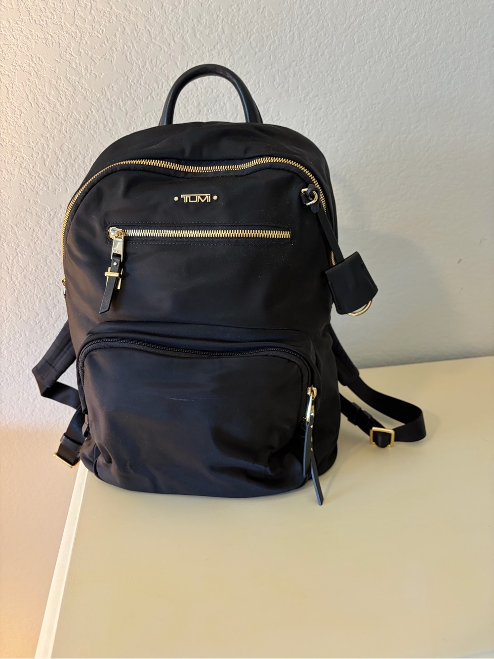 Tumi Black Nylon Backpack with Gold-Tone Accents